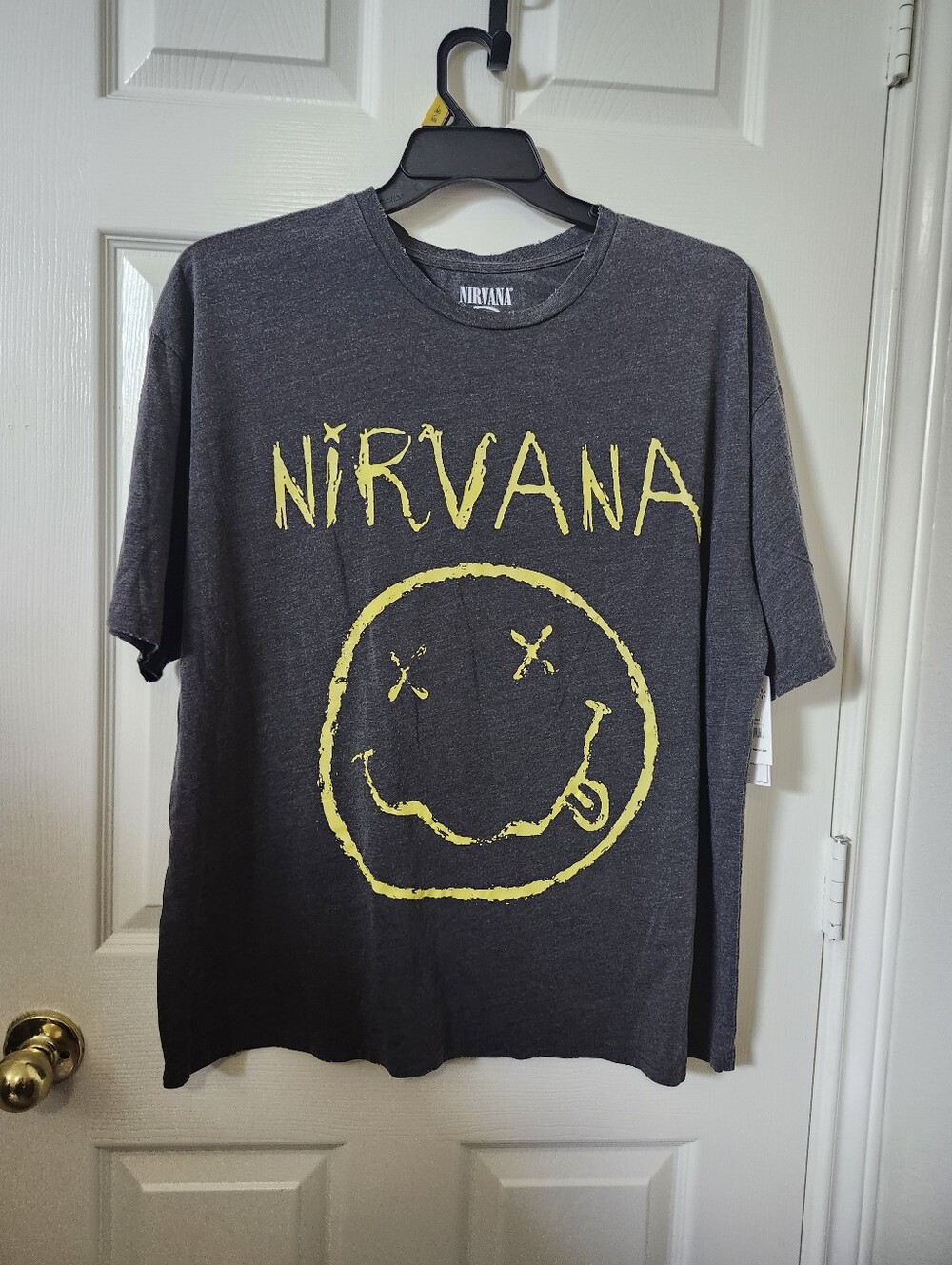 Nirvana Men's Black Short-Sleeve Graphic Tee with Yellow Logo
